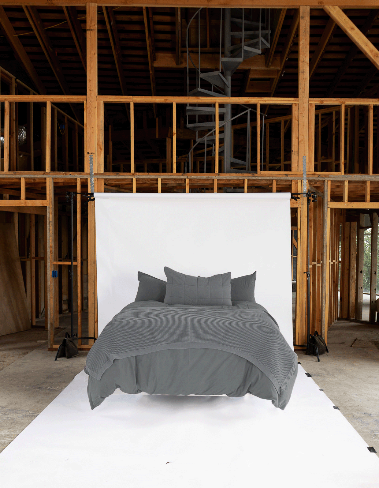 Bay Antik Matelasse Throw on Styled Bed with Tru Duvet Cover - Front View | MATTEO