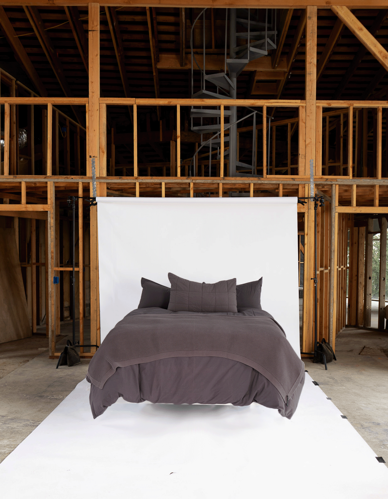 Fig Antik Matelasse Throw Blanket on Styled Bed - Editorial Front View | MATTEO