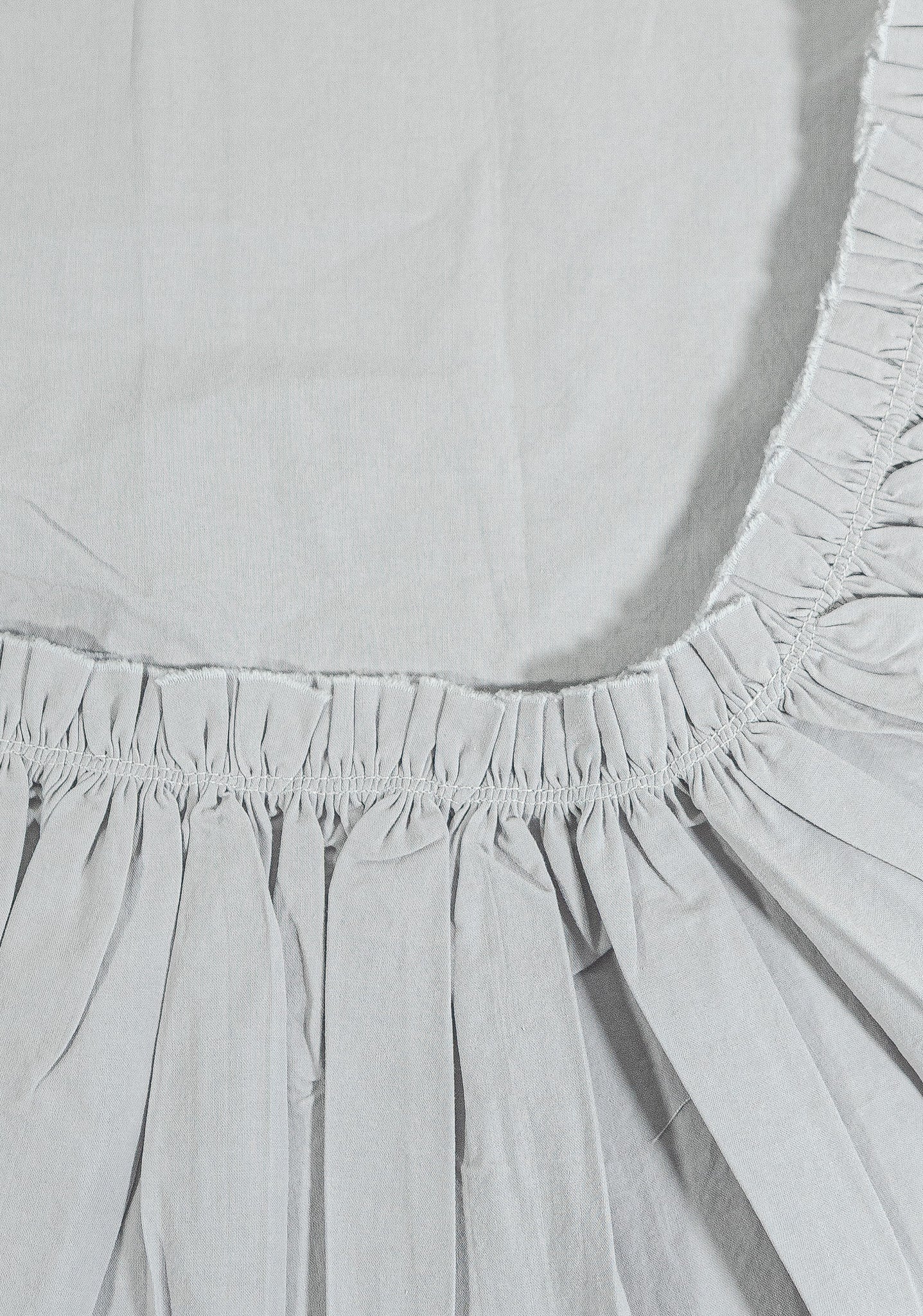Mica Tat Cotton Fabric with Tattered Ruffle Detail - Close Up | MATTEO
